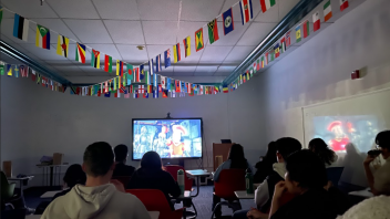 Students watch a movie